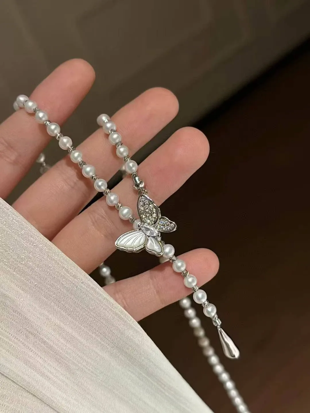 Pearl Necklace with Butterfly Pendant image indicator(2)