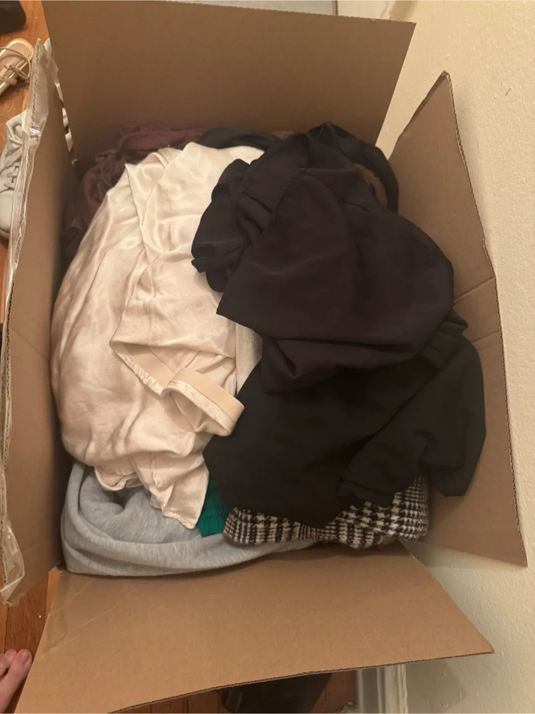 Box of assorted clothes
