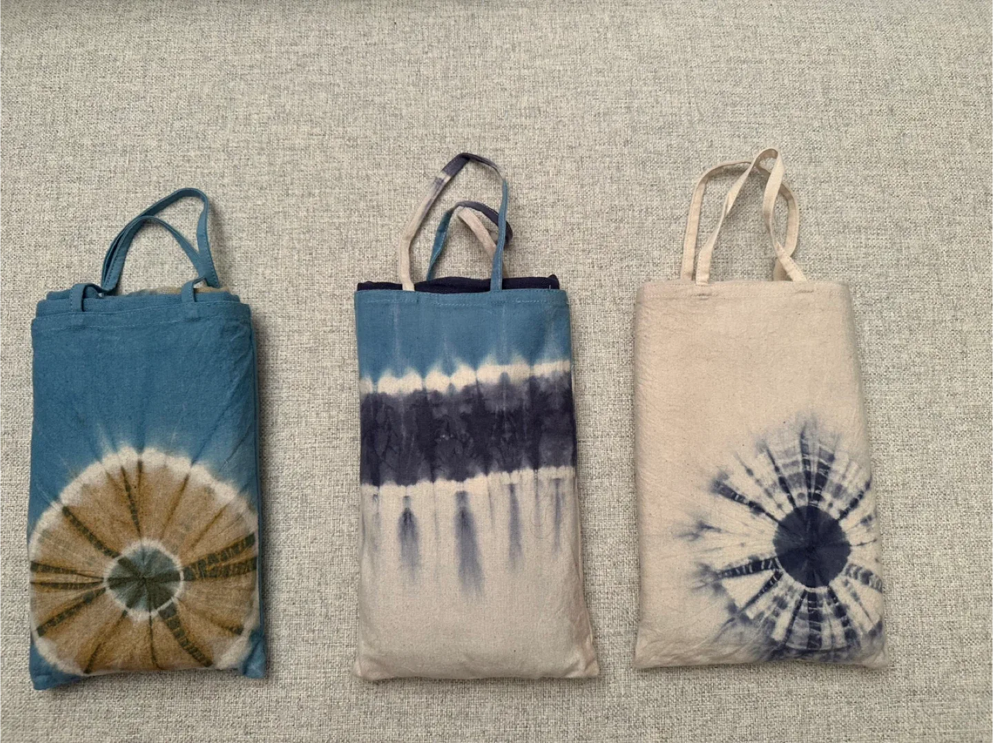 Fair trade cotton tie-dyes sarongs in matching bag