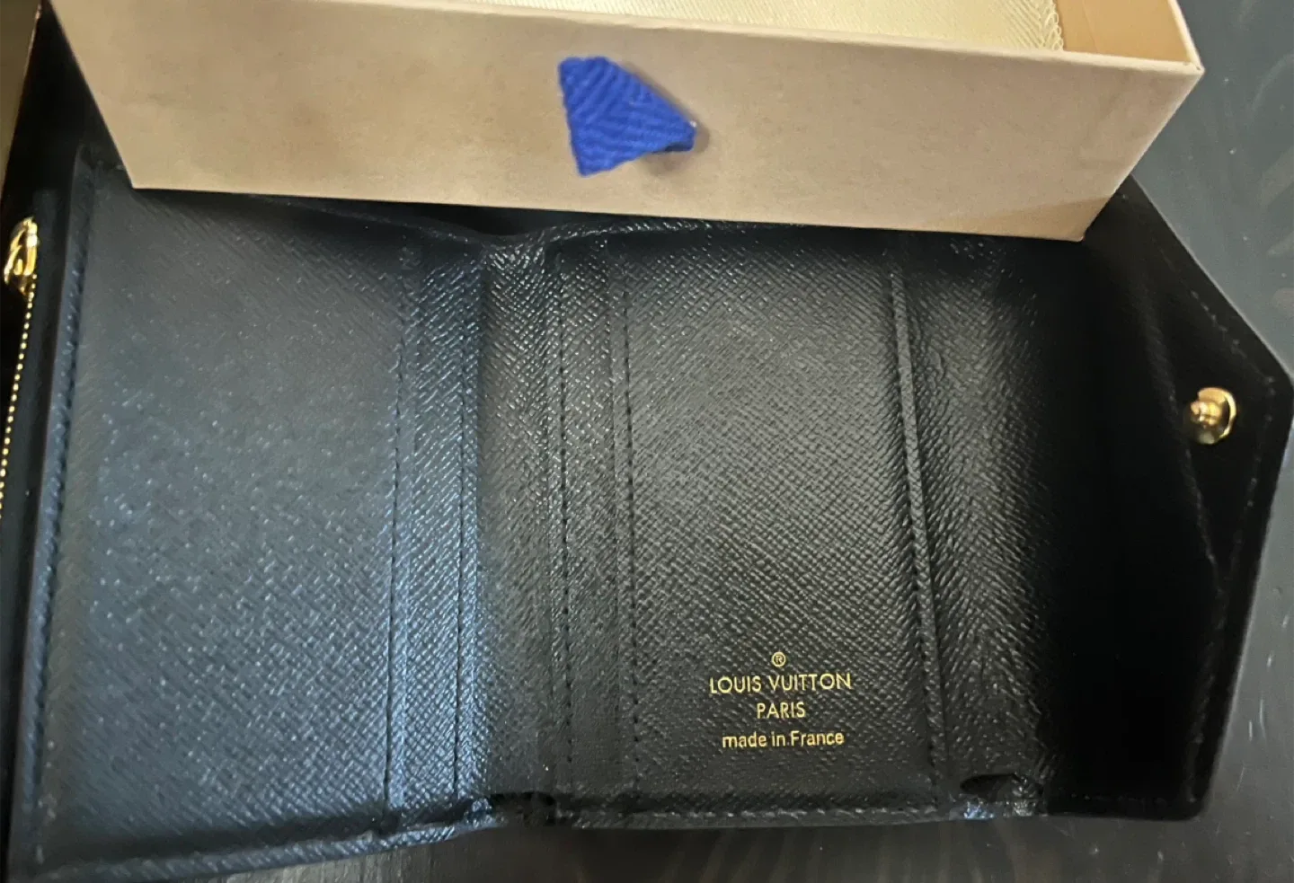 Louis Vuitton Reverse Zoe Wallet image indicator(4)
