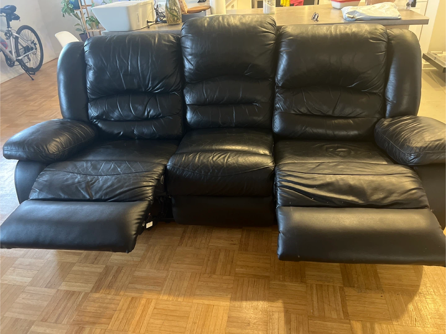 Black Leather Reclining Sofa
