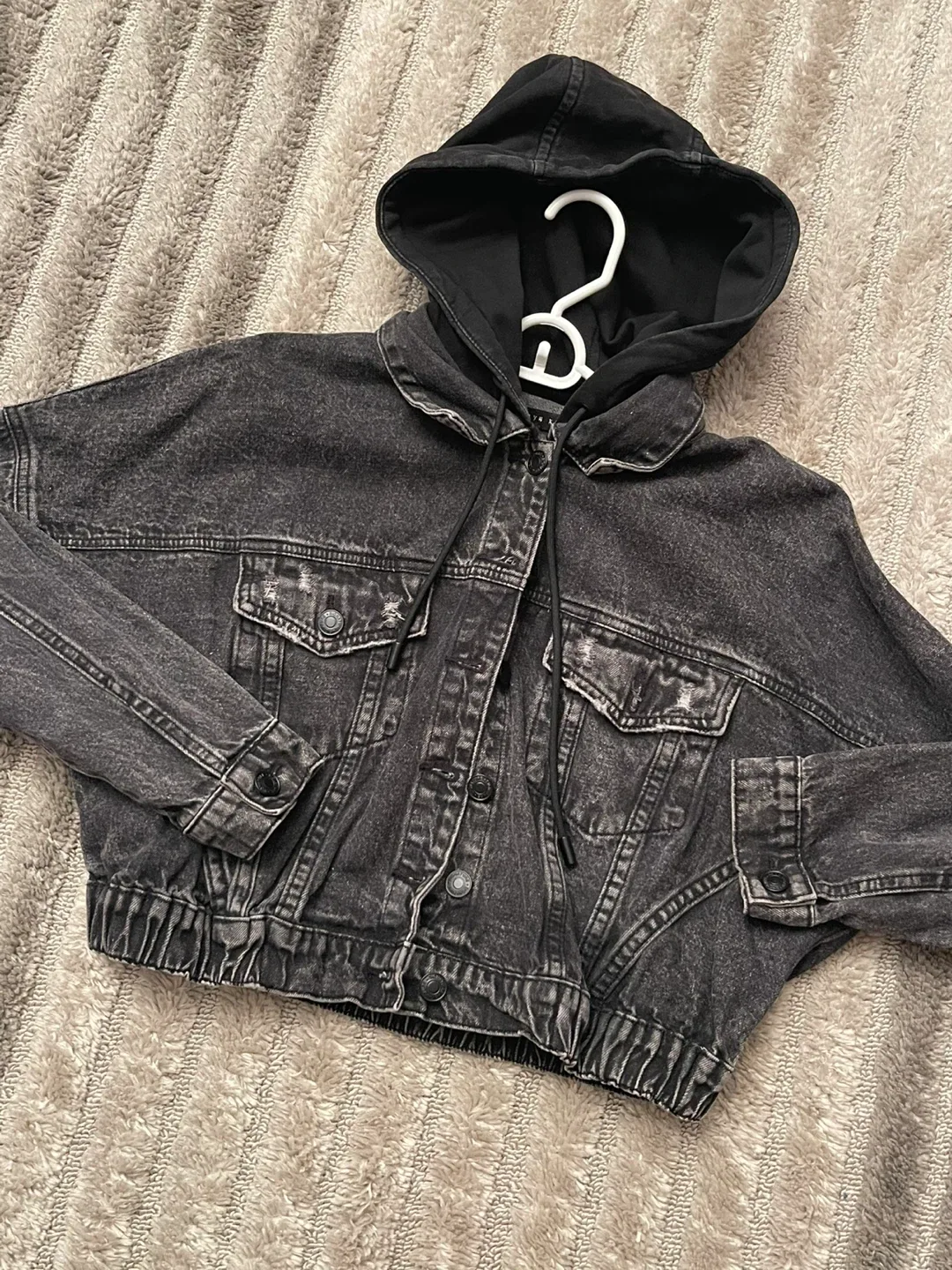 Cropped black denim jacket with attached cotton hood