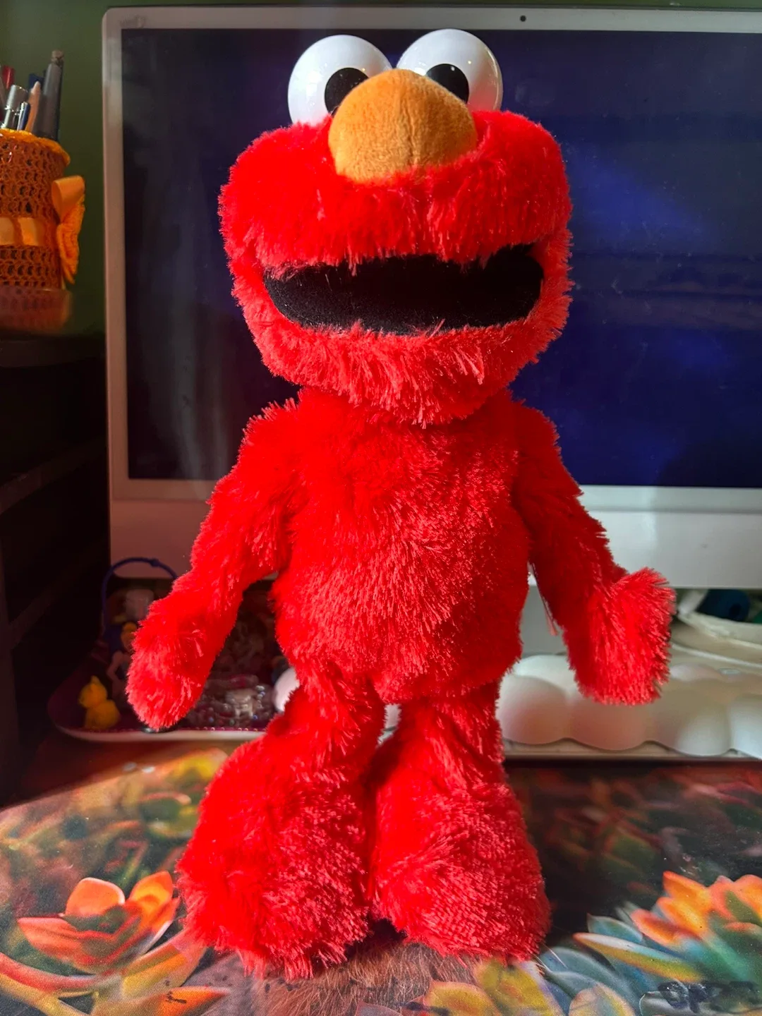 Elmo slide talks and dance