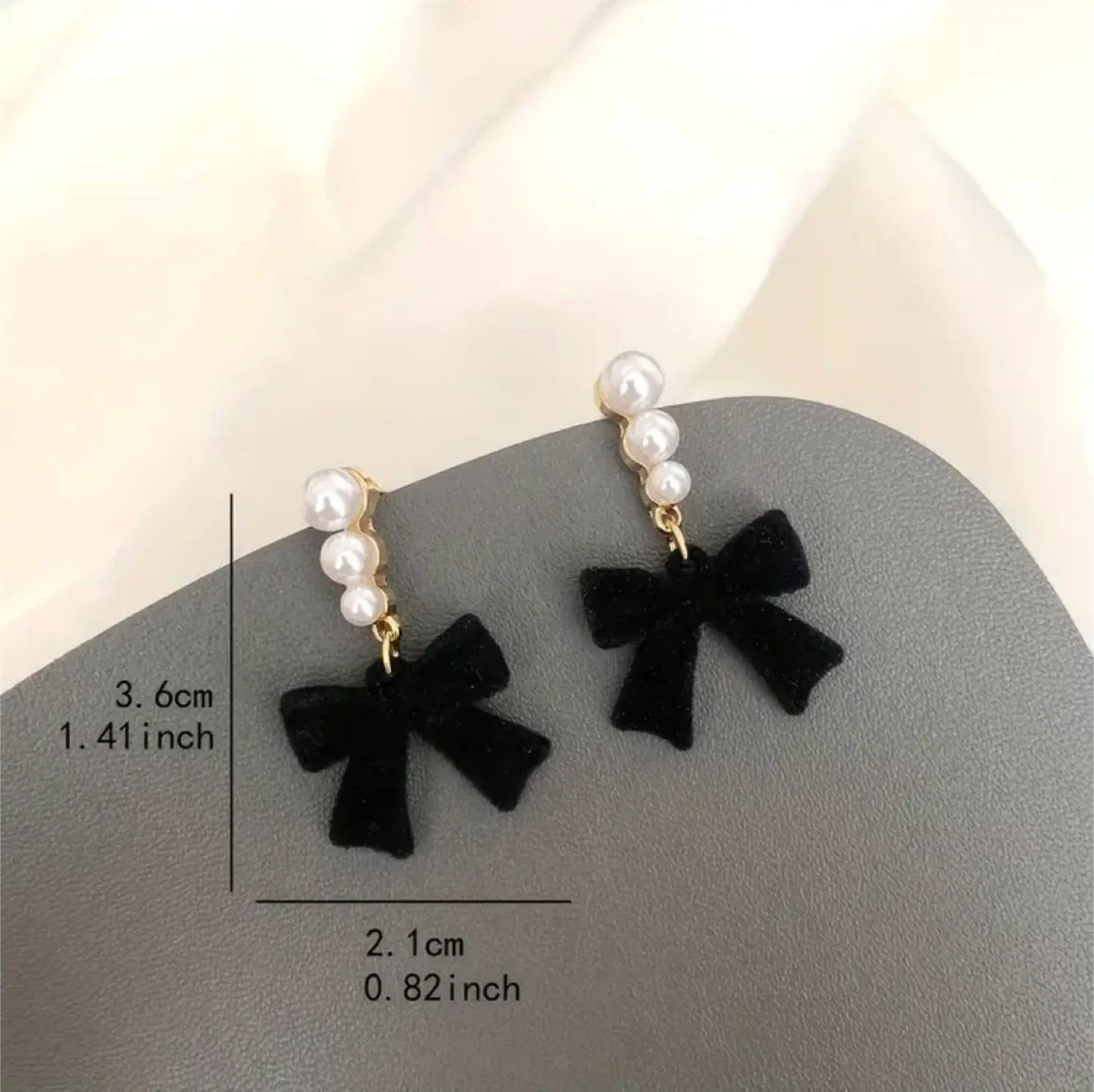 Black Velvet Bow Pearl Earrings image indicator(4)