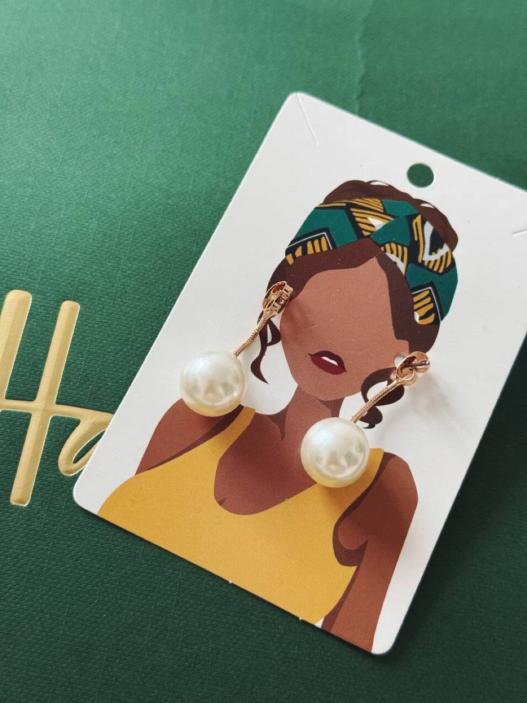 White faux pearl earrings