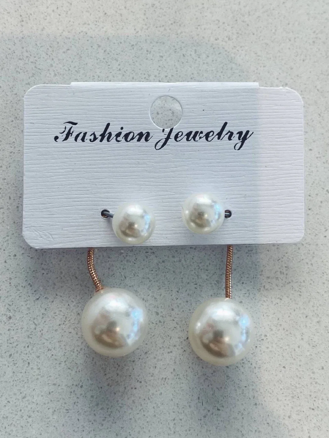 White faux pearl earrings image indicator(2)