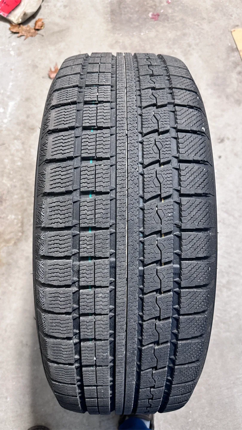 Winter Tire on Black Alloy Rim - 225 60 18 image indicator(2)