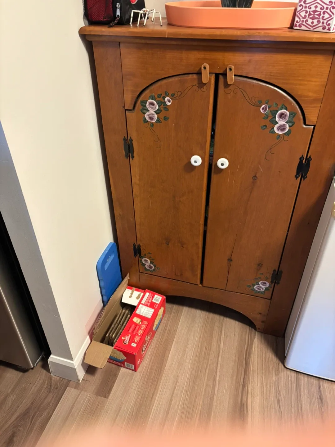 Wooden Cabinet with Floral Details