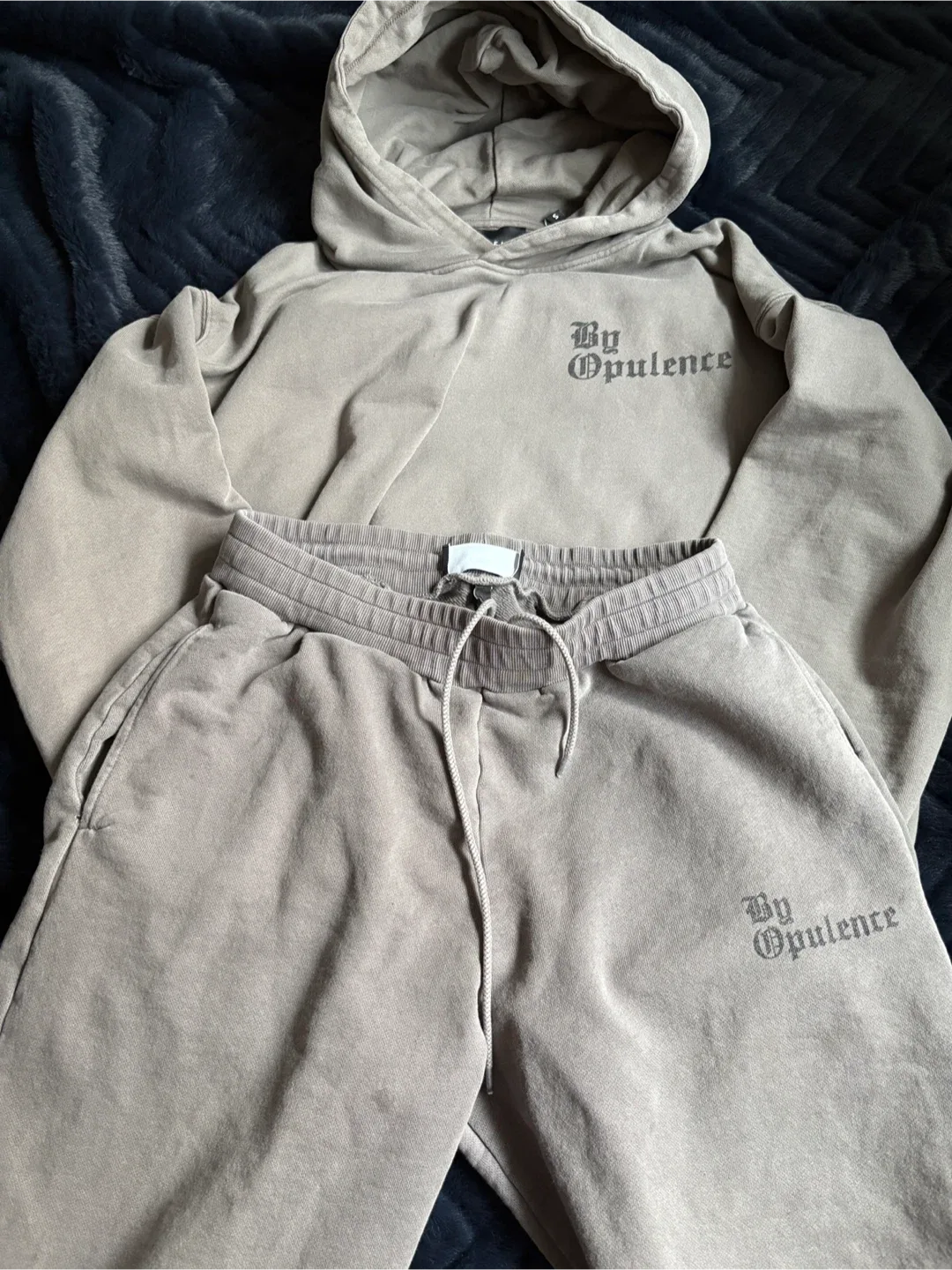 by opulence tracksuit