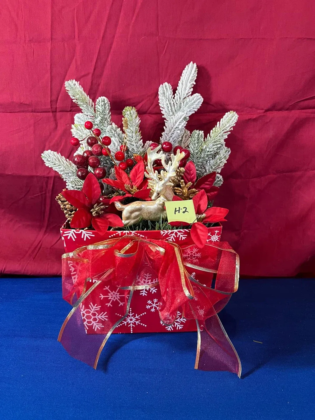 Christmas Floral Arrangement with Reindeer