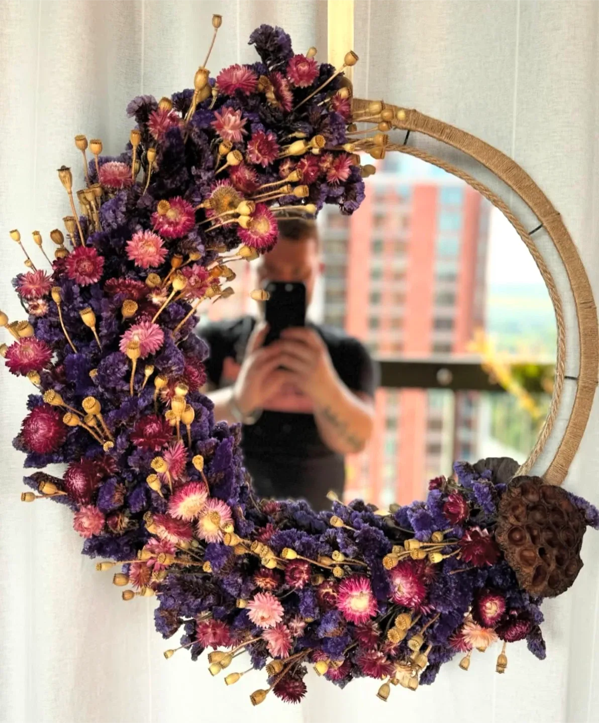 Mirror decorated with dried flowers