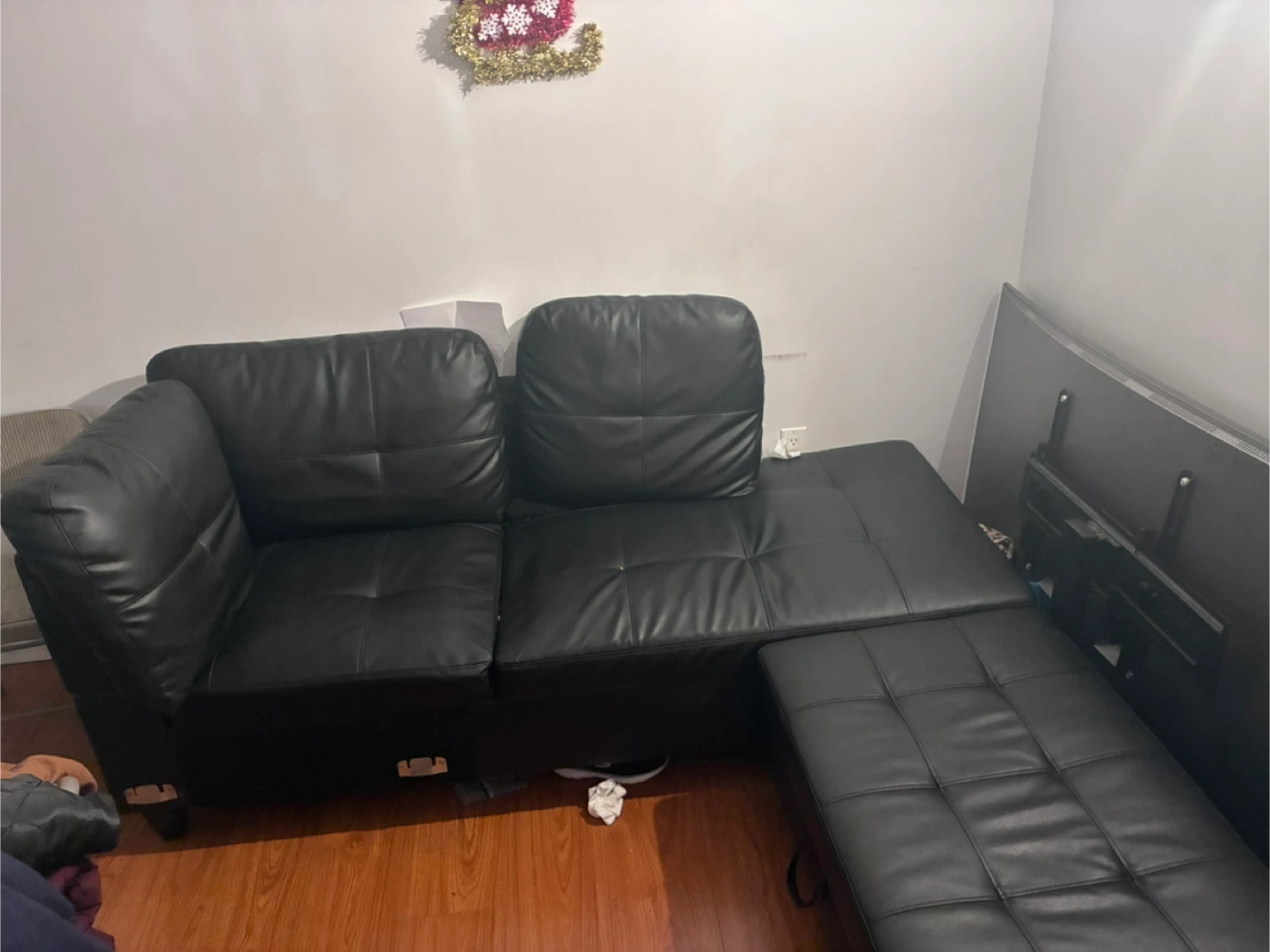 Black Leather Sectional Sofa with Ottoman - photo 2