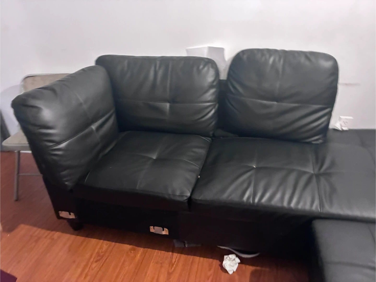 Black Leather Sectional Sofa with Ottoman - photo 3