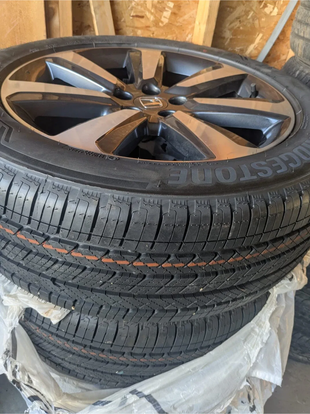 Bridgestone 235/50R20 105H M+S call 780 884 7800Tire image indicator(3)