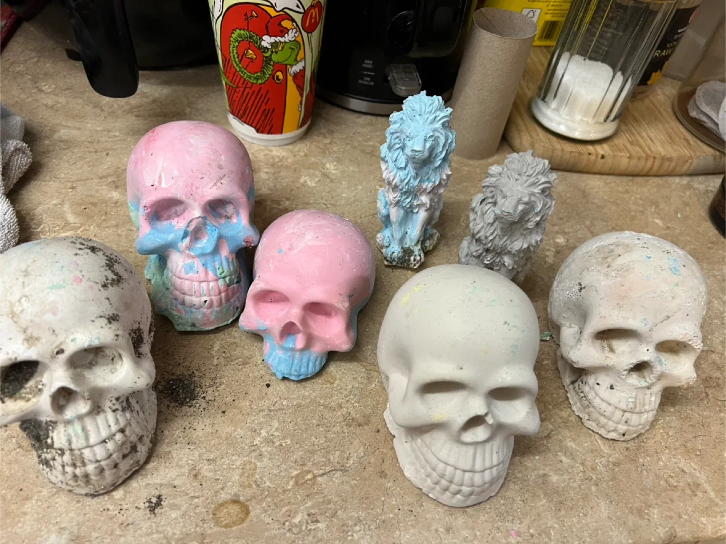 Painted Skull & Lion Figurines