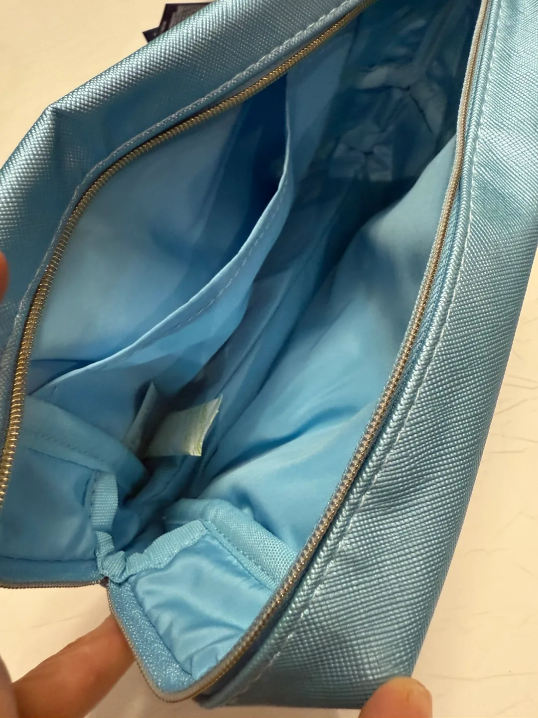 Elemis Blue Cosmetic Bag #cleanout image indicator(2)