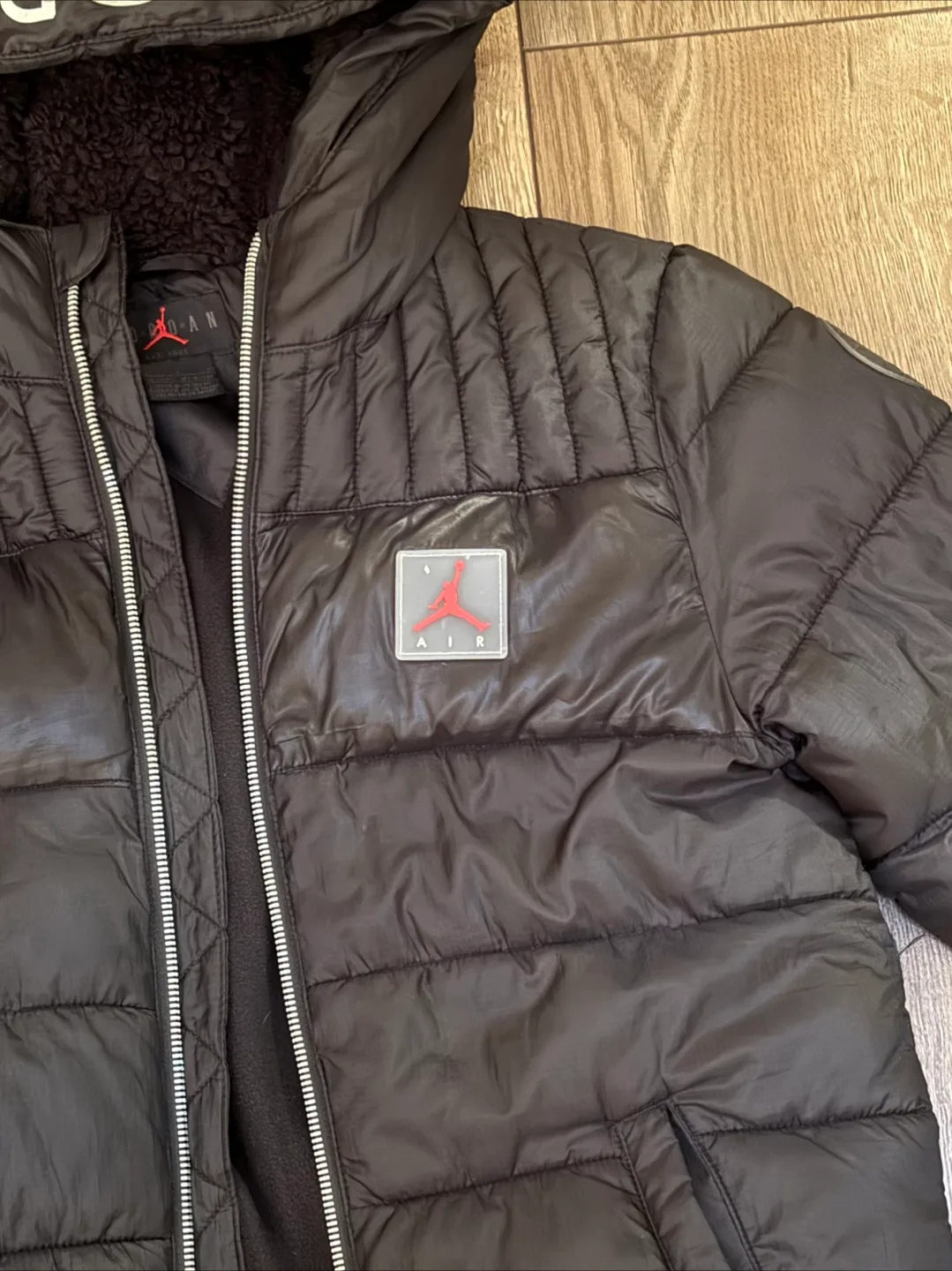 Air Jordan Black Puffer Jacket image indicator(3)