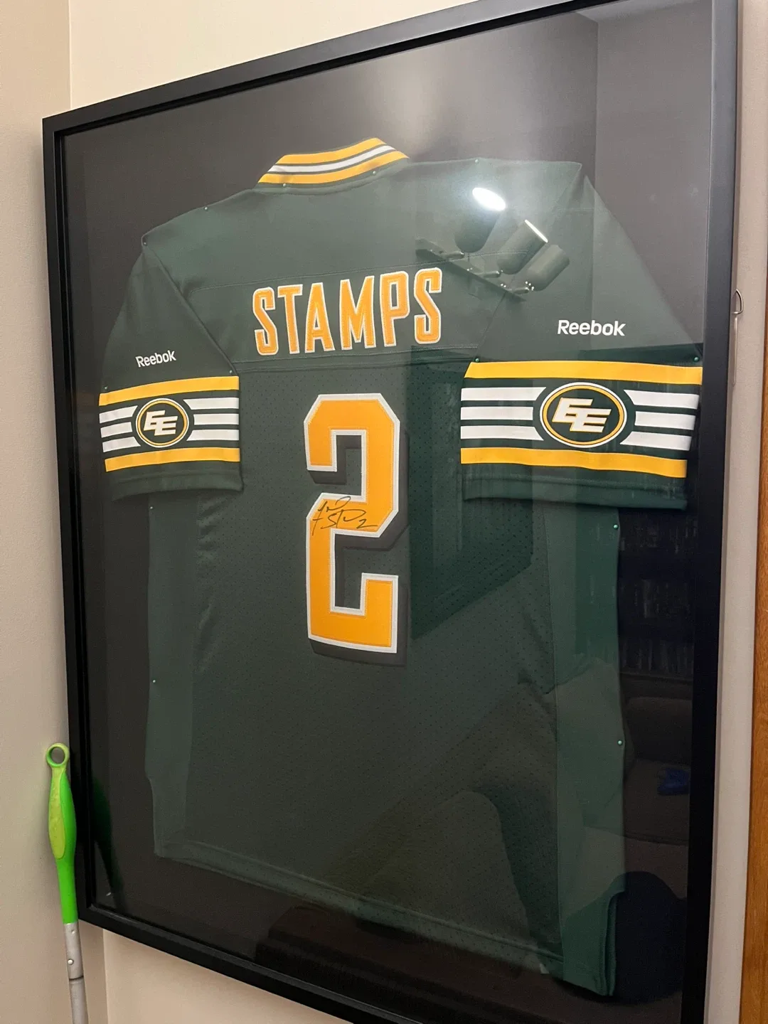 Two Signed Eskimo Jerseys in Shadow Boxes