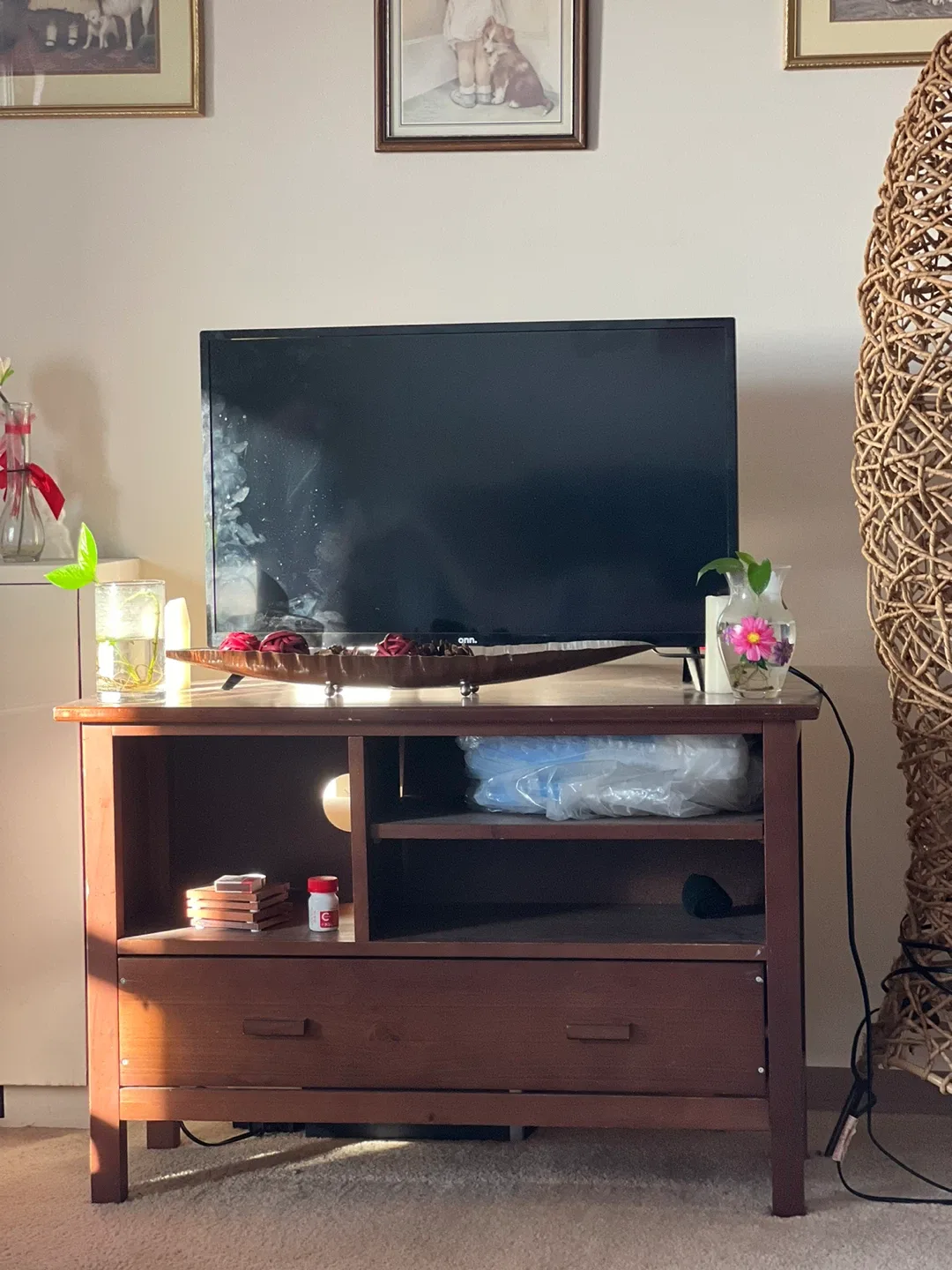 Roku Tv and Wooden TV Stand