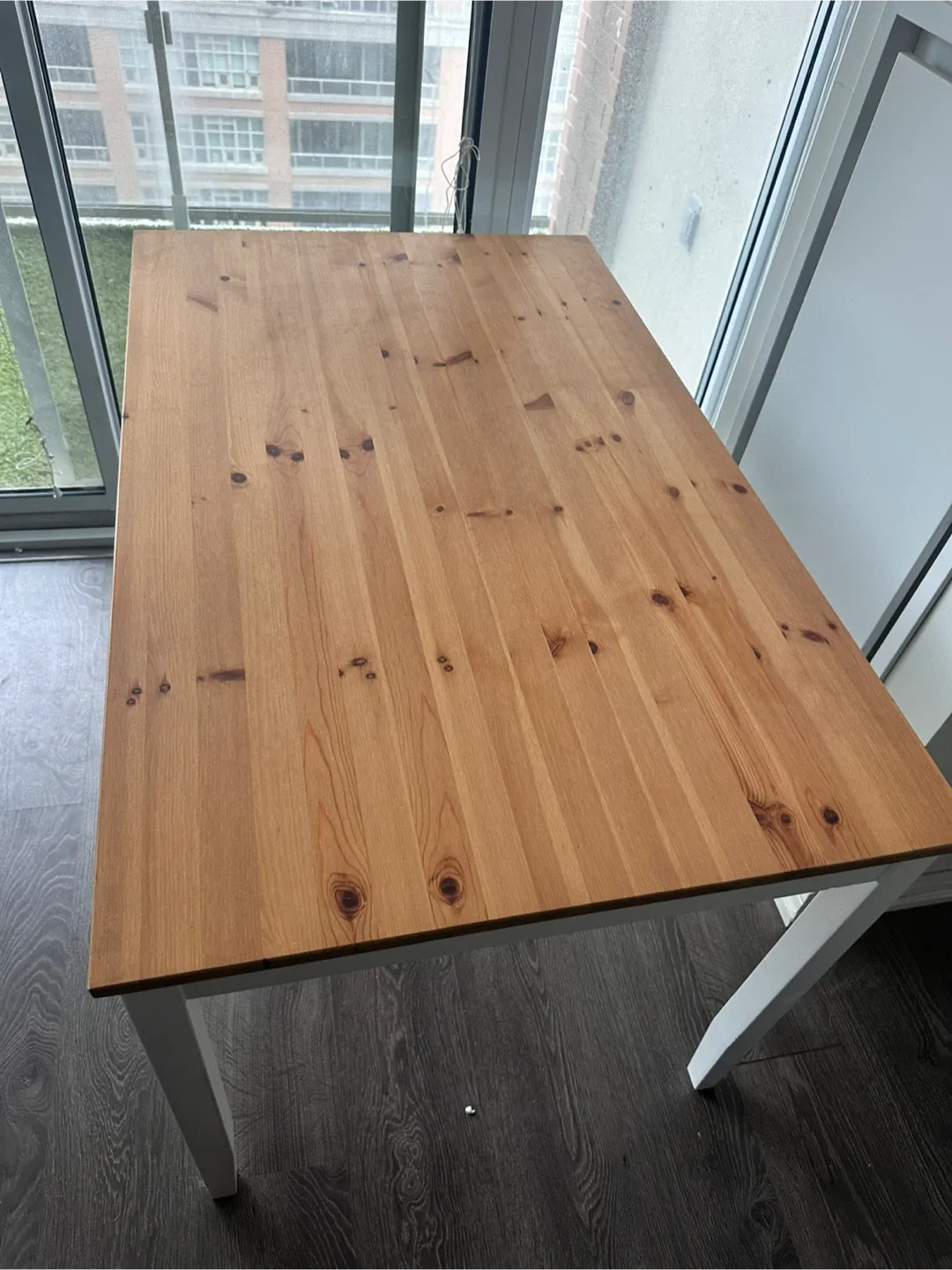 Wood dining table with white legs