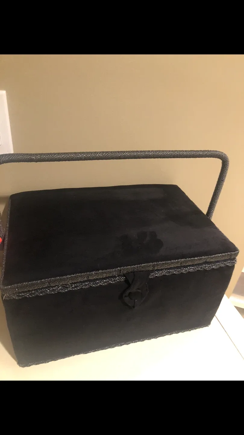Vintage sewing box with thread