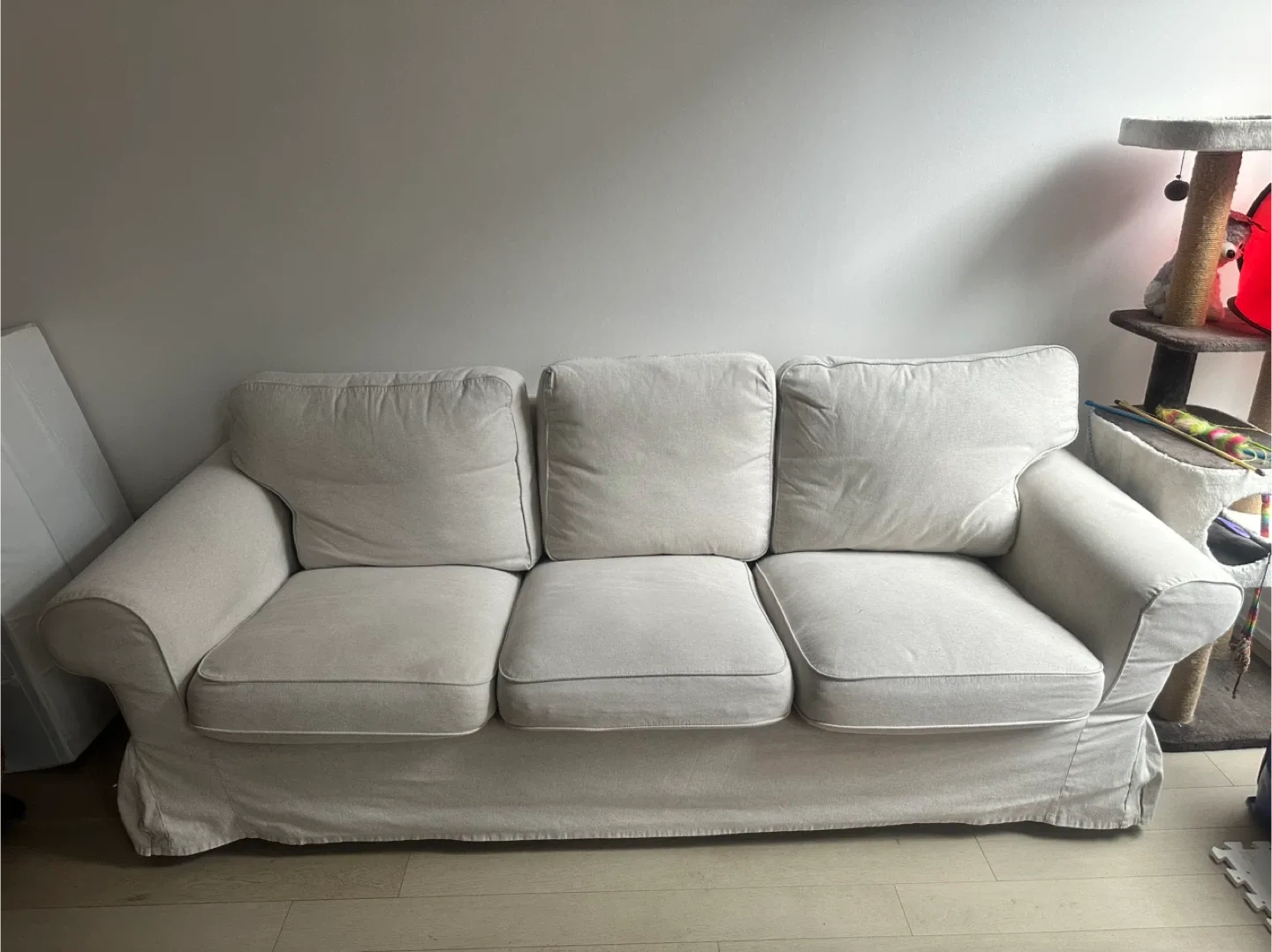 Comfortable White Three-Seat Sofa from IKEA