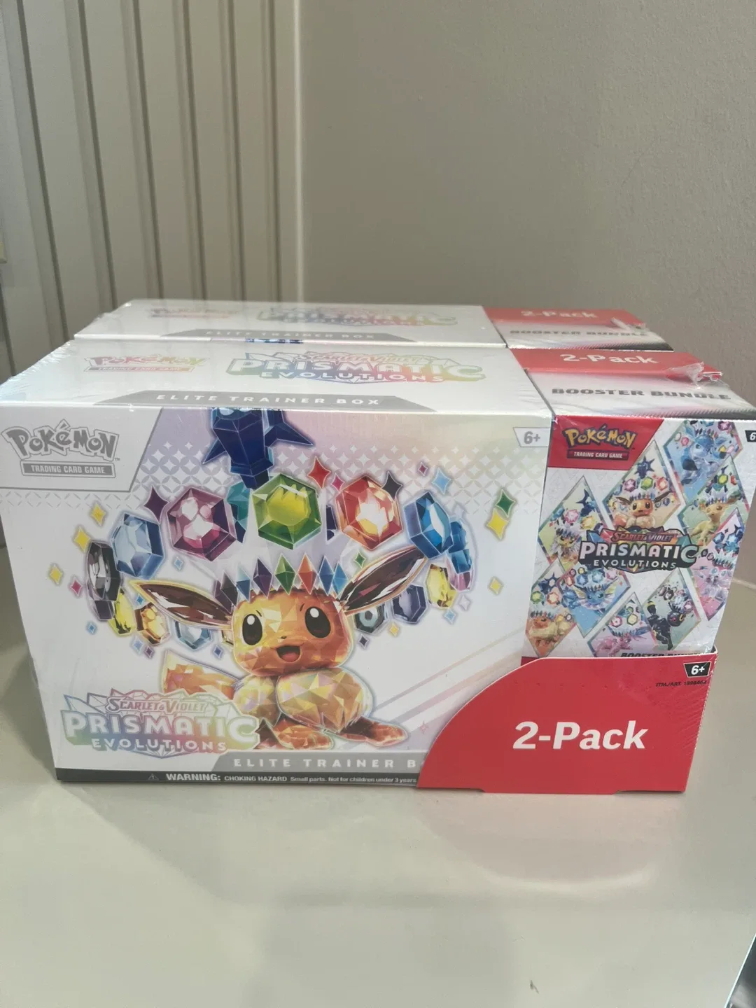 Prismatic Evolutions ETB + Booster Bundle