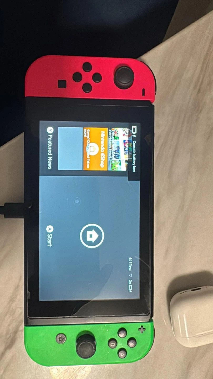 Nintendo Switch with Red and Green Joy-Cons - photo 3