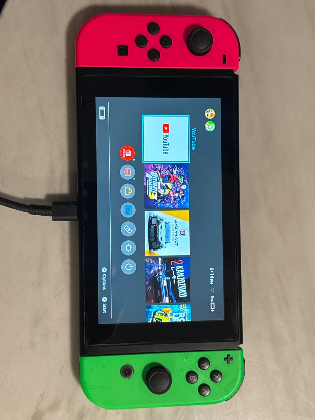 Nintendo Switch with Red and Green Joy-Cons