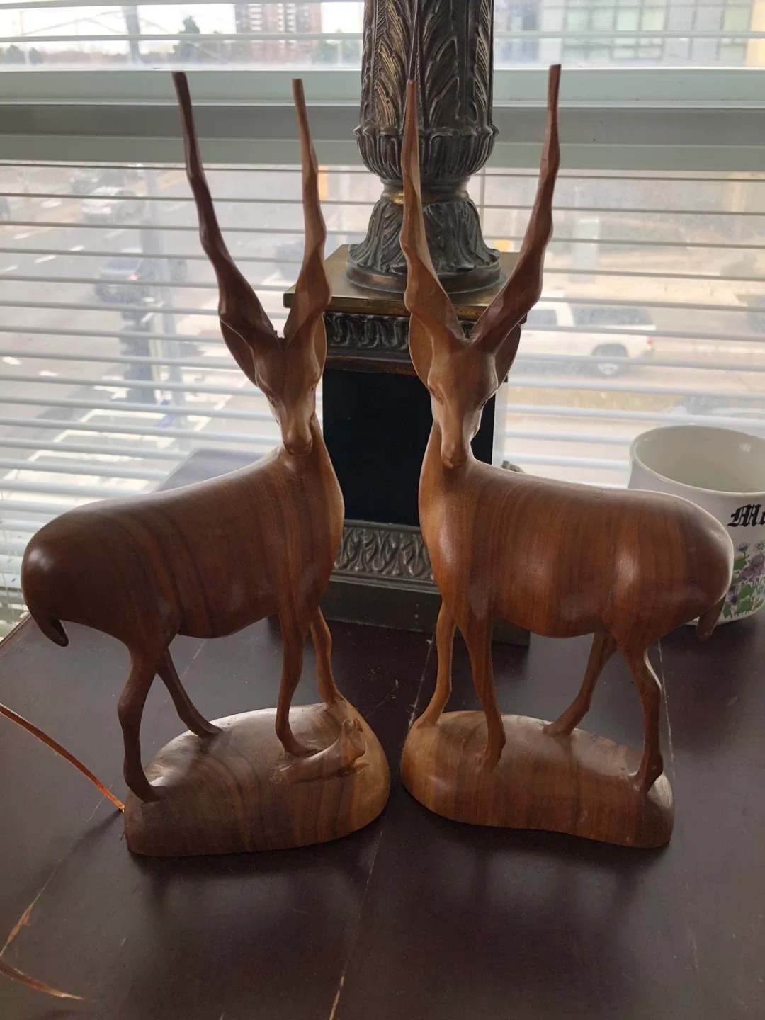 Two wooden antelopes image indicator(3)