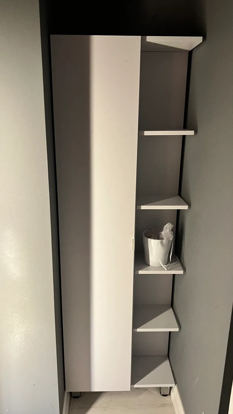 White cabinet with shelves and cupboard