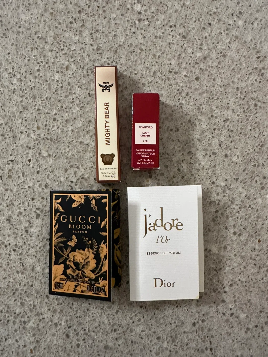 MCM Mighty Bear, Tom Ford Lost Cherry, Gucci Bloom, Dior J'adore