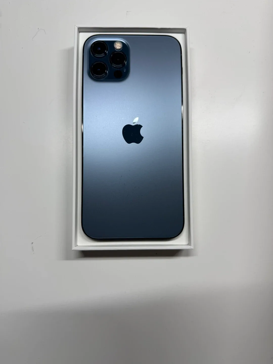 iPhone 12 Pro with cases