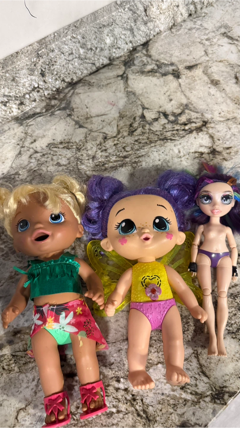 Three Assorted Dolls