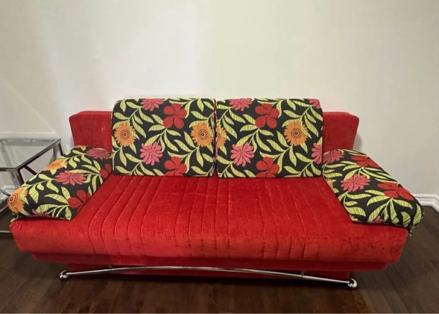 Red Futon with Floral Cushions