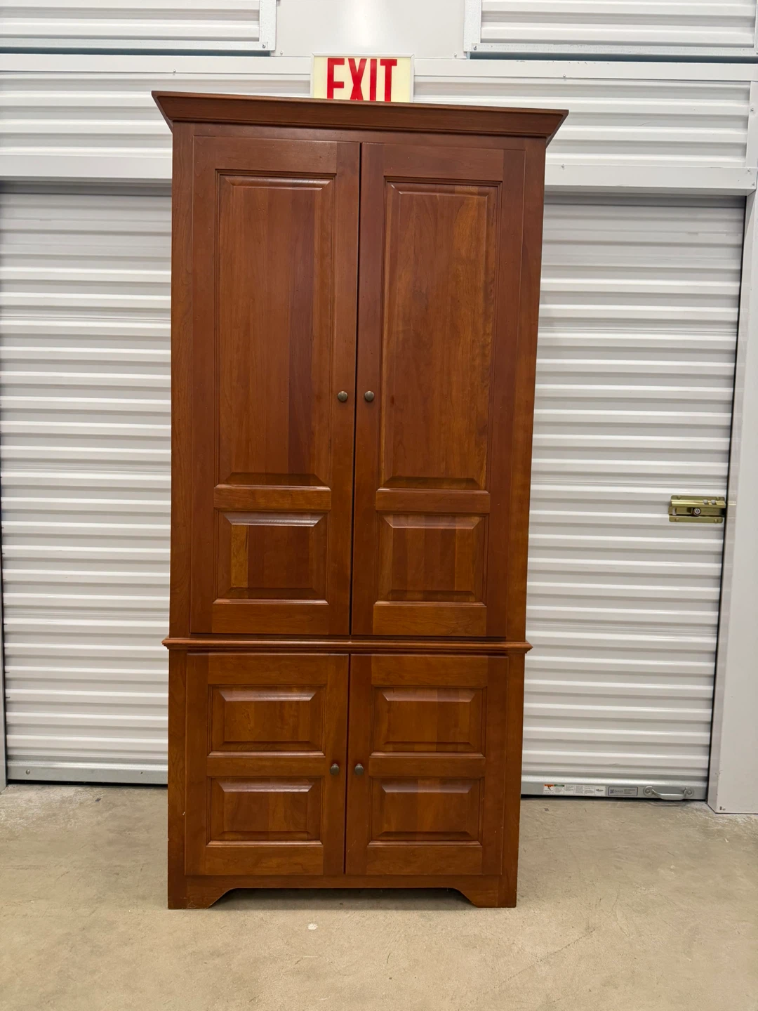 Wooden Armoire with Shelves and Drawers