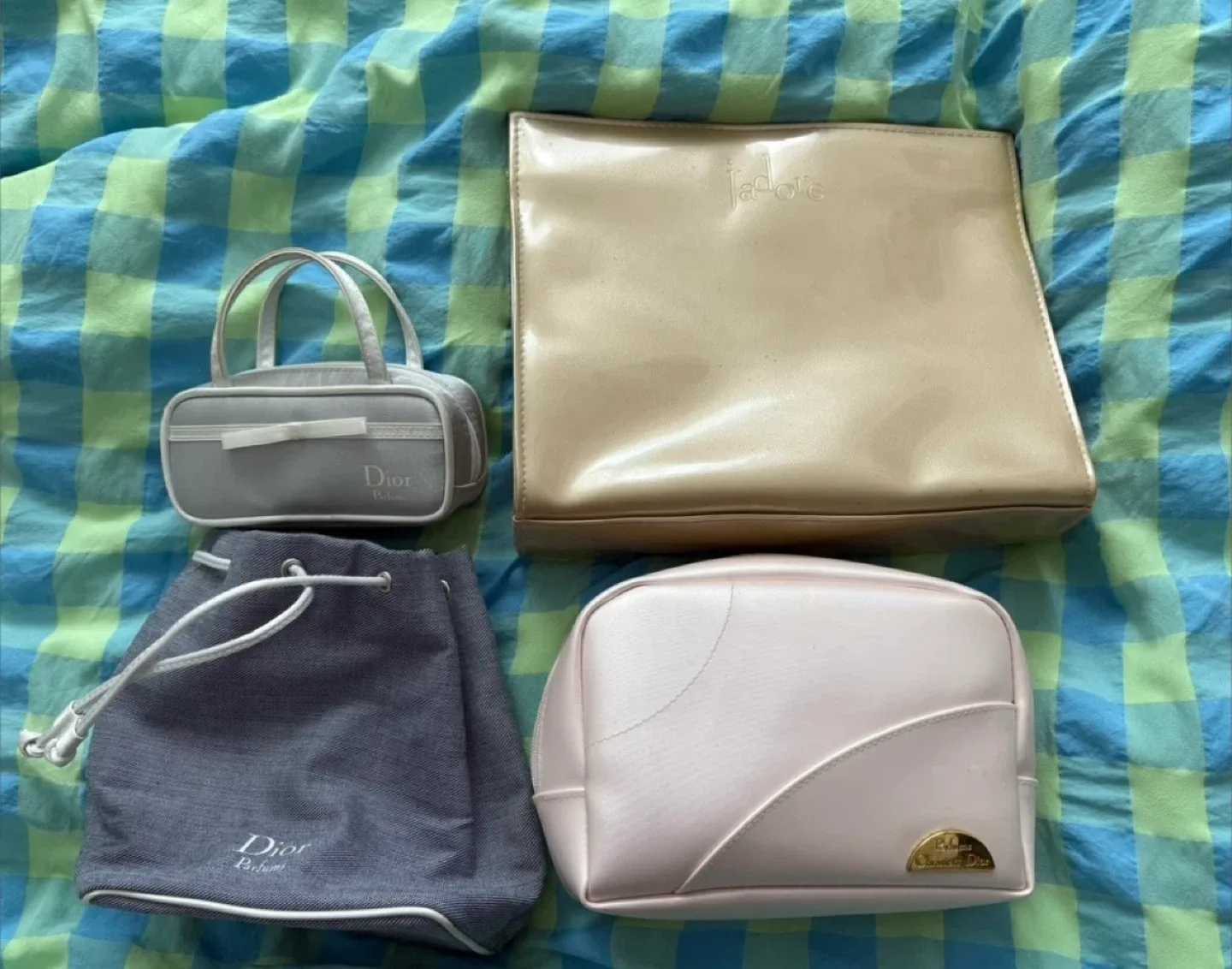 4 Dior Cosmetic bags(Good/fair condition)(Giving away for FREE)