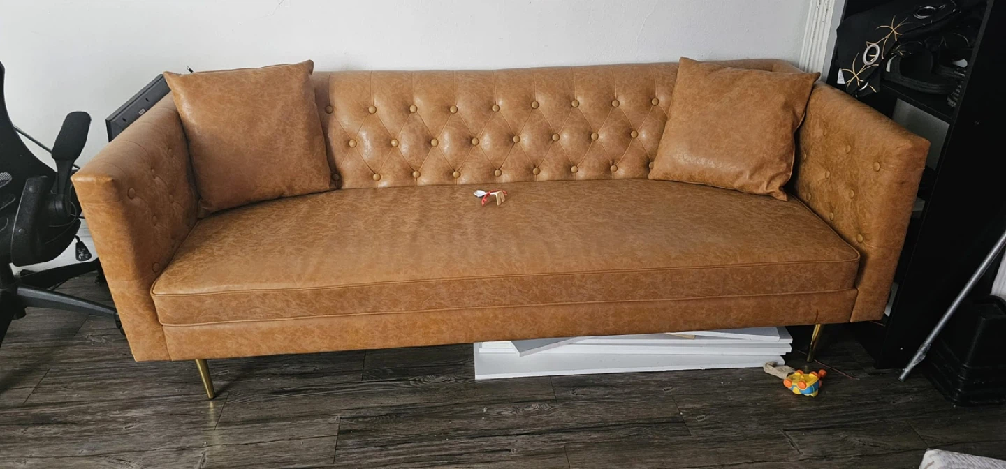 Tan Tufted Sofa with Pillows