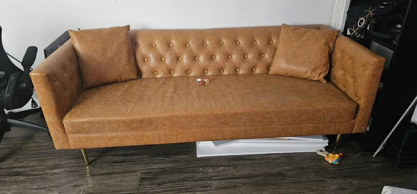 Tan Tufted Sofa with Pillows