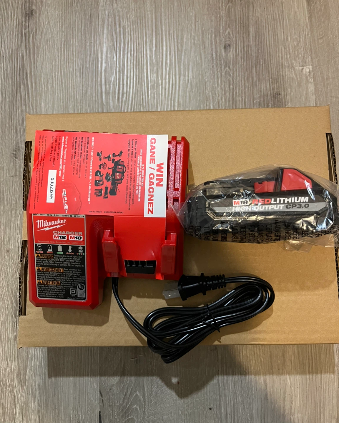 Milwaukee M12/M18 Battery Charger & M18 REDLITHIUM CP3.0 Battery - photo 2