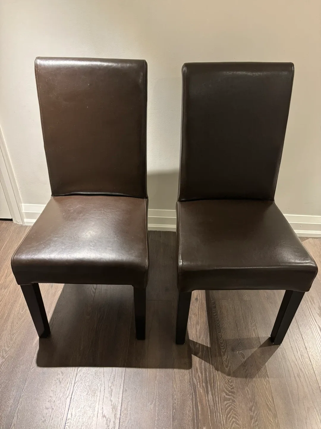 Set of 2 brown faux leather chairs