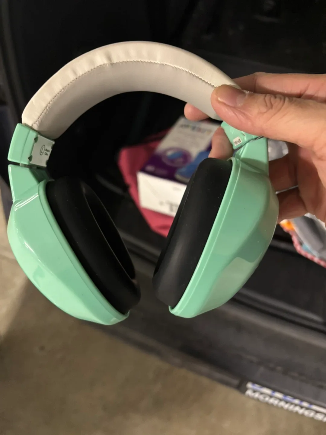Used Mint Green Kids noise cancelling for travelling
