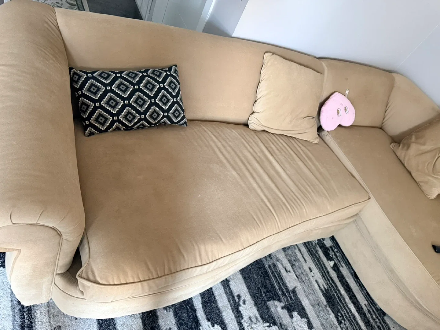 Beige Sectional Sofa with Cushions