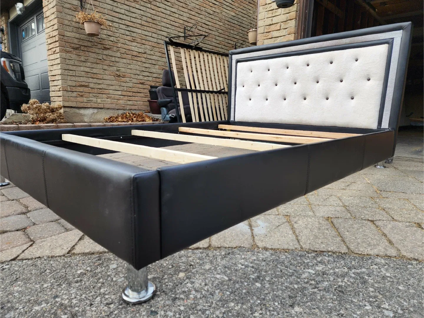 Black upholstered bed frame image indicator(9)