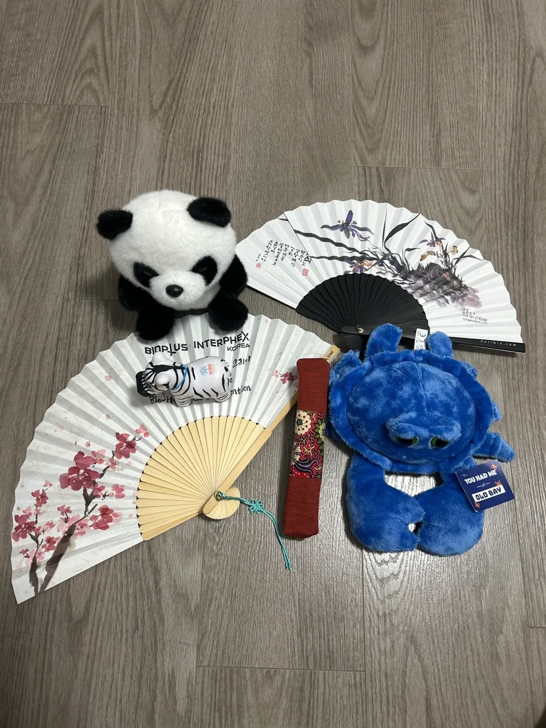 Assorted Fans & Plush Toys