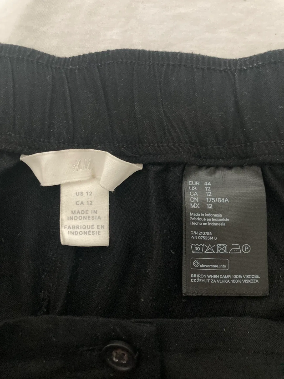 High waisted raised black wide leg trousers image indicator(2)