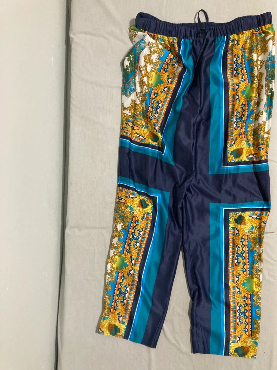 Printed satiny tapered trousers