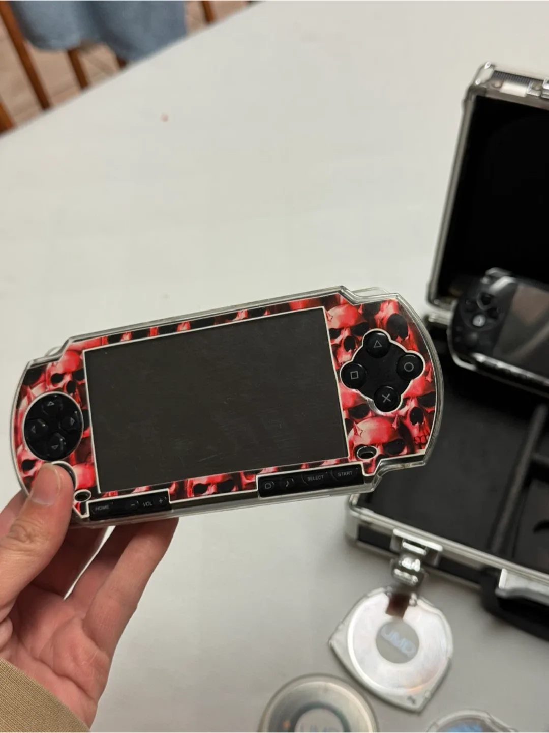 2 Sony PSP  with games image indicator(3)