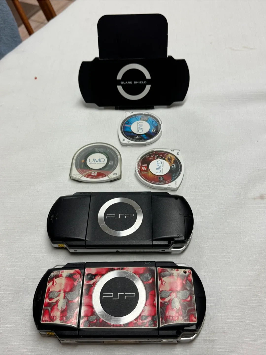 2 Sony PSP  with games image indicator(7)