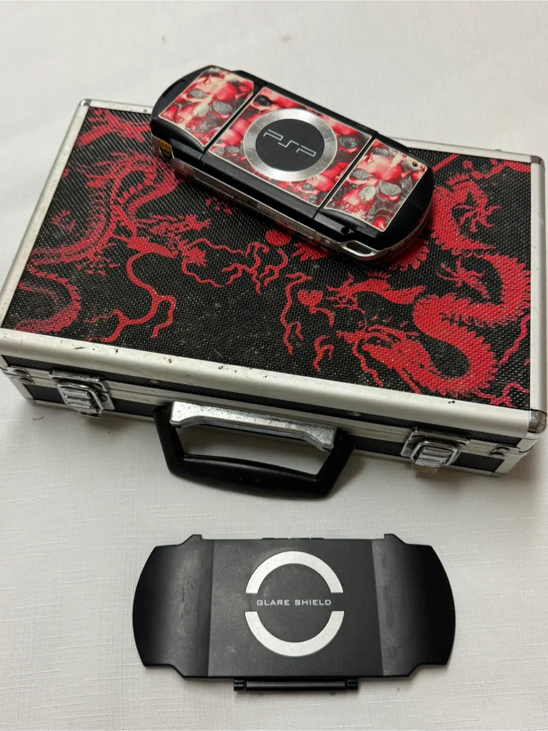 2 Sony PSP  with games image indicator(10)